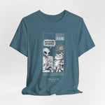The TO RULE t-shirt in Heather Deep Teal — oceanic tone bringing depth to the comic layout.