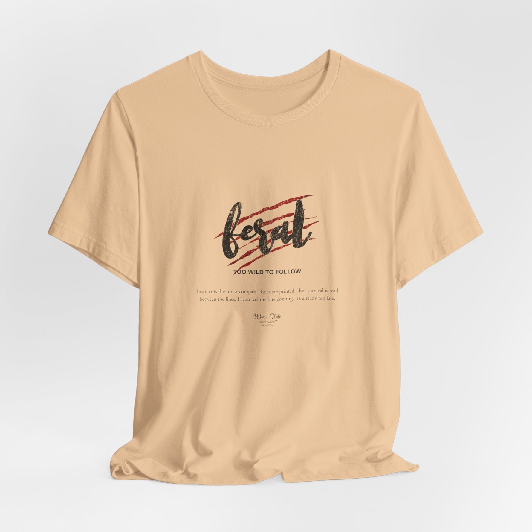 The FERAL t-shirt in Sand Dune — the quiet terrain where instincts sharpen.