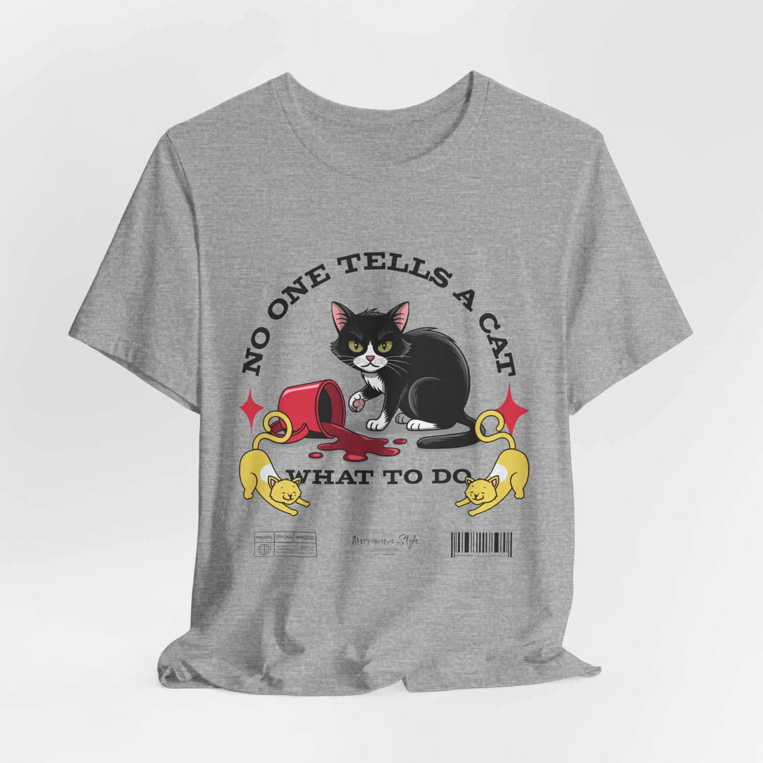 The No One Tells a Cat t-shirt in athleticheather — ghost mockup showing a light grey heather fabric with no background or model.