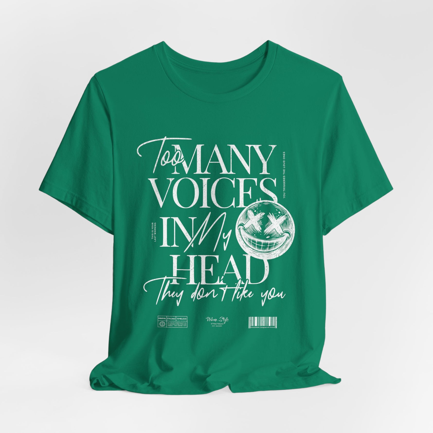 The MANY VOICES t-shirt in Kelly — Sharp green with unsettling clarity.