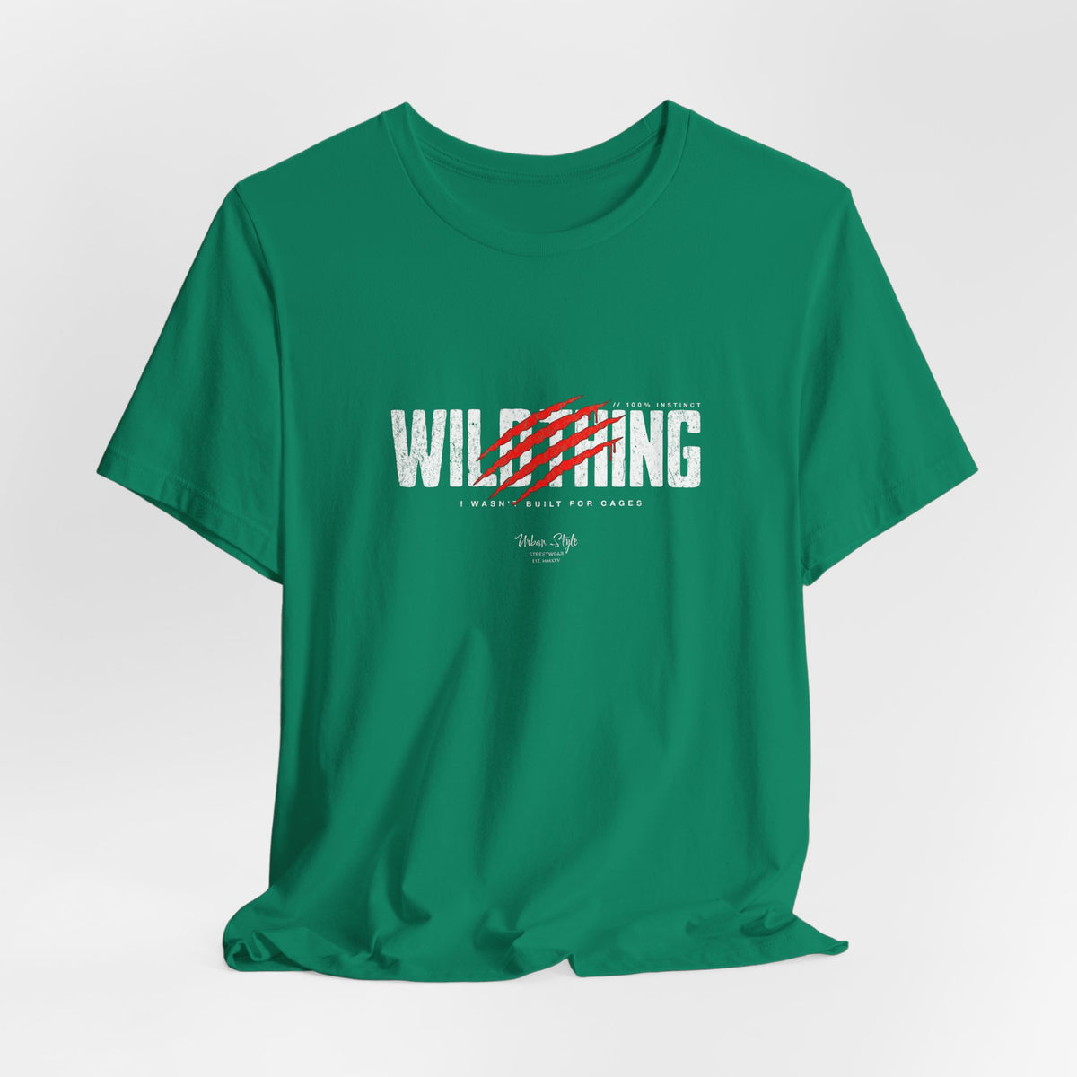 The WILDTHING t-shirt in Kelly — Wild green backdrop makes the claw slash feel almost alive.