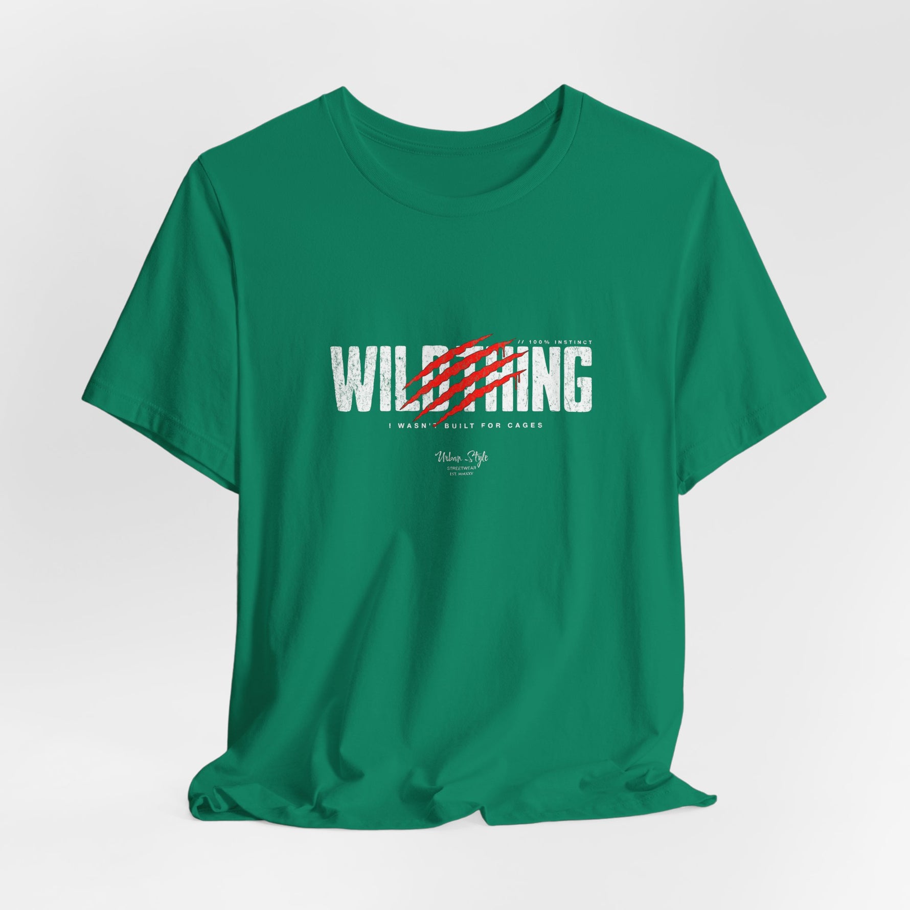 The WILDTHING t-shirt in Kelly — Wild green backdrop makes the claw slash feel almost alive.