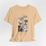 The Satisfiction t-shirt in sand dune — 3D mockup showing a soft, beige-tan tone. No background or model.