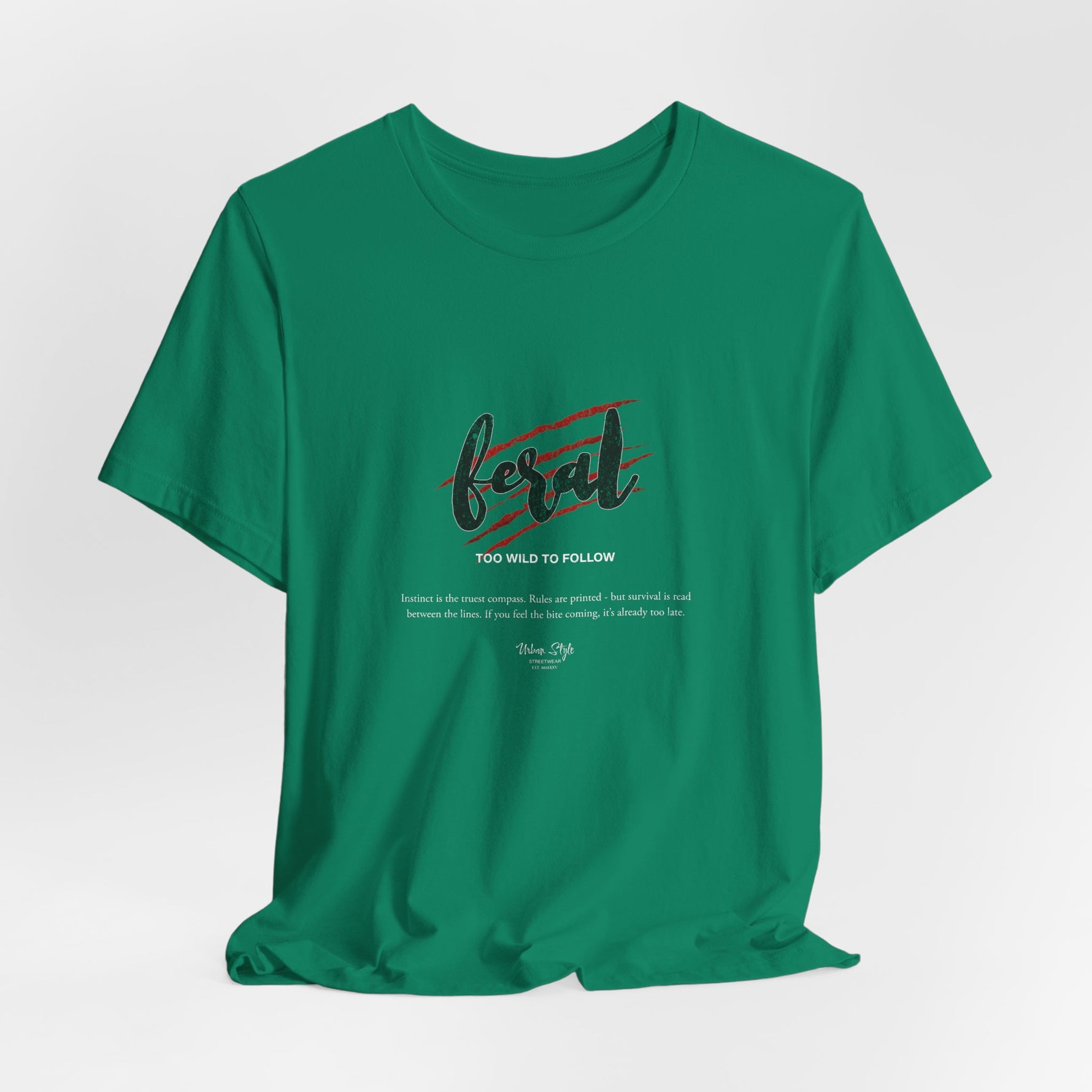 The FERAL t-shirt in Kelly — primal growth breaking through.