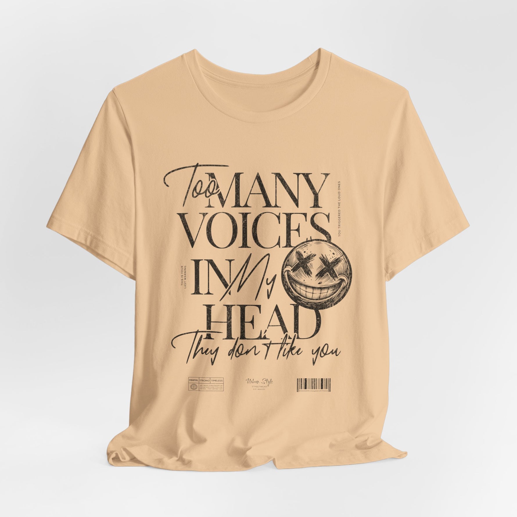 The MANY VOICES t-shirt in Sand Dune — Quiet color, loud signals.