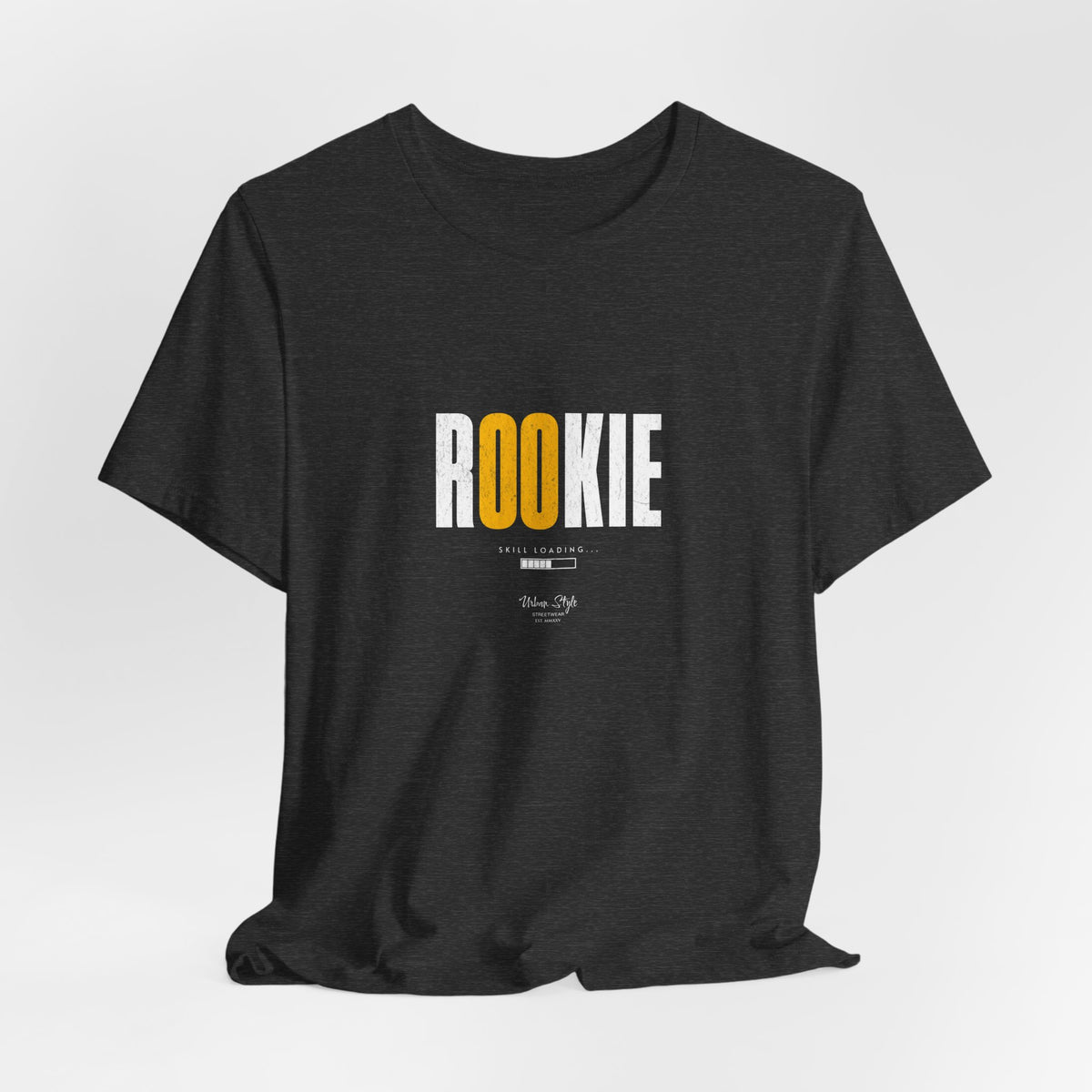 The ROOKIE t-shirt in Dark Heather Grey — steady, unsure, but stepping in.