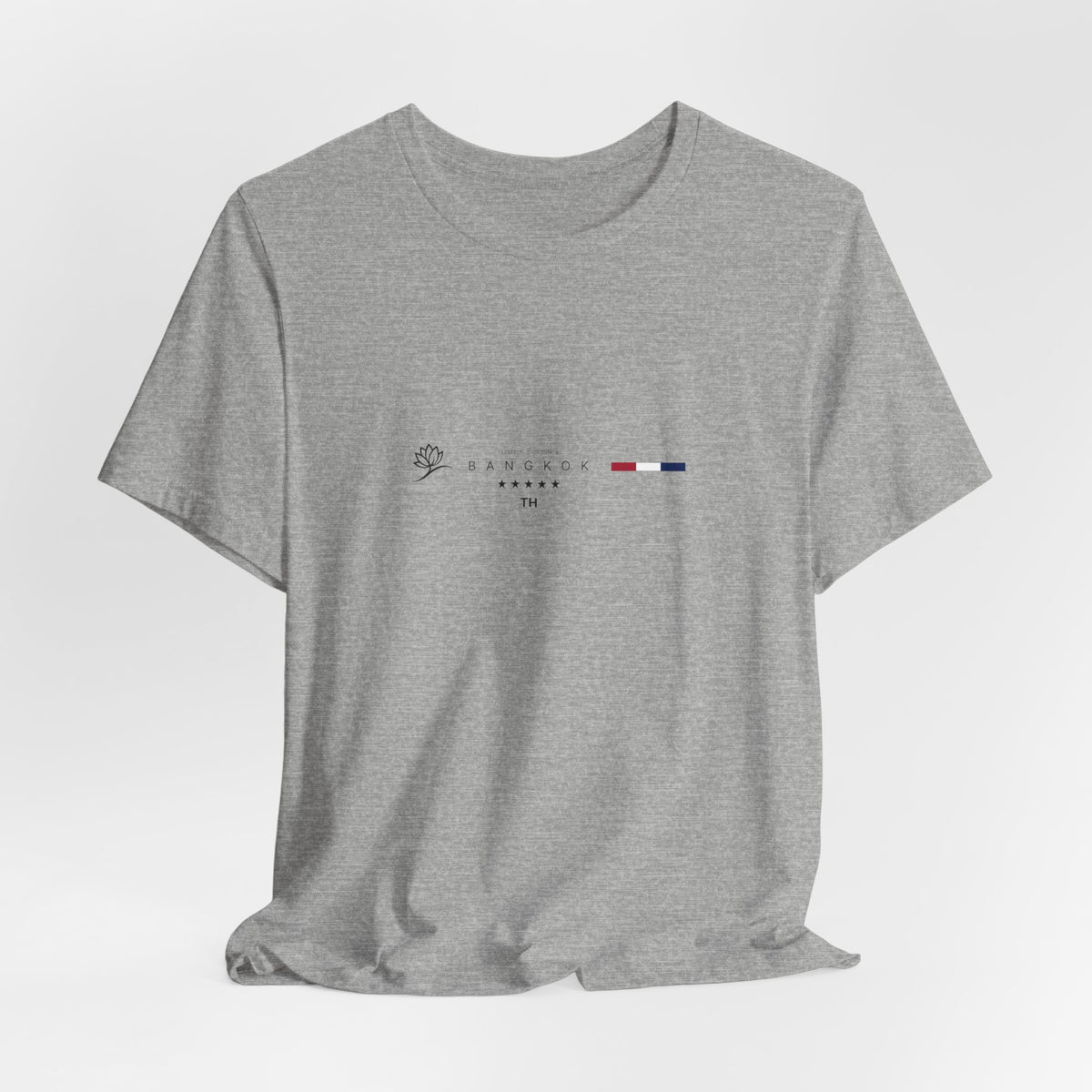 The BANGKOK t-shirt in Athletic Heather — a sleek heathered gray, light and breathable for city heat.