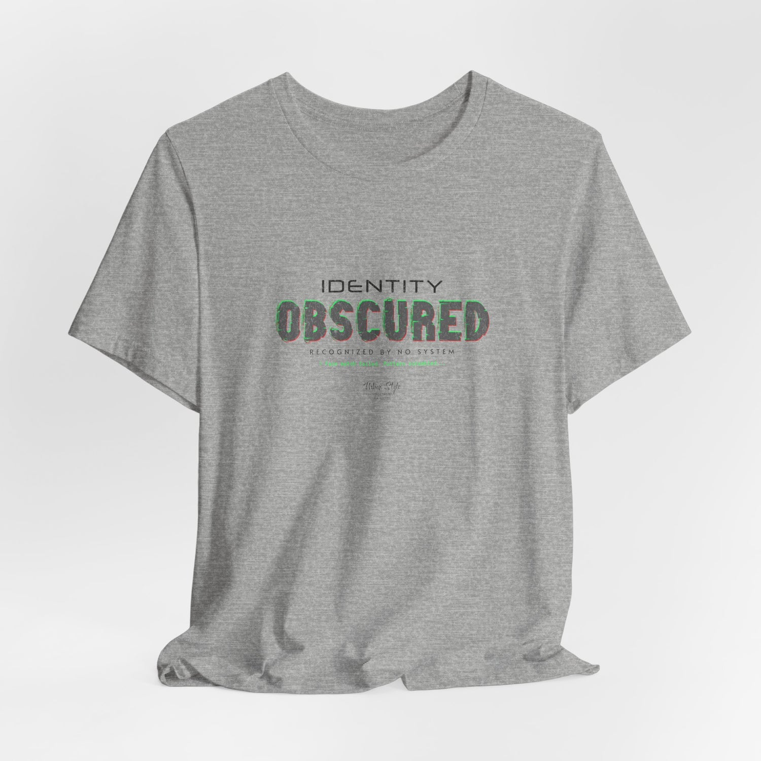 The IDENTITY OBSCURED t-shirt in Athletic Heather — 3D mockup of a light heather grey shirt. No background. No model.
