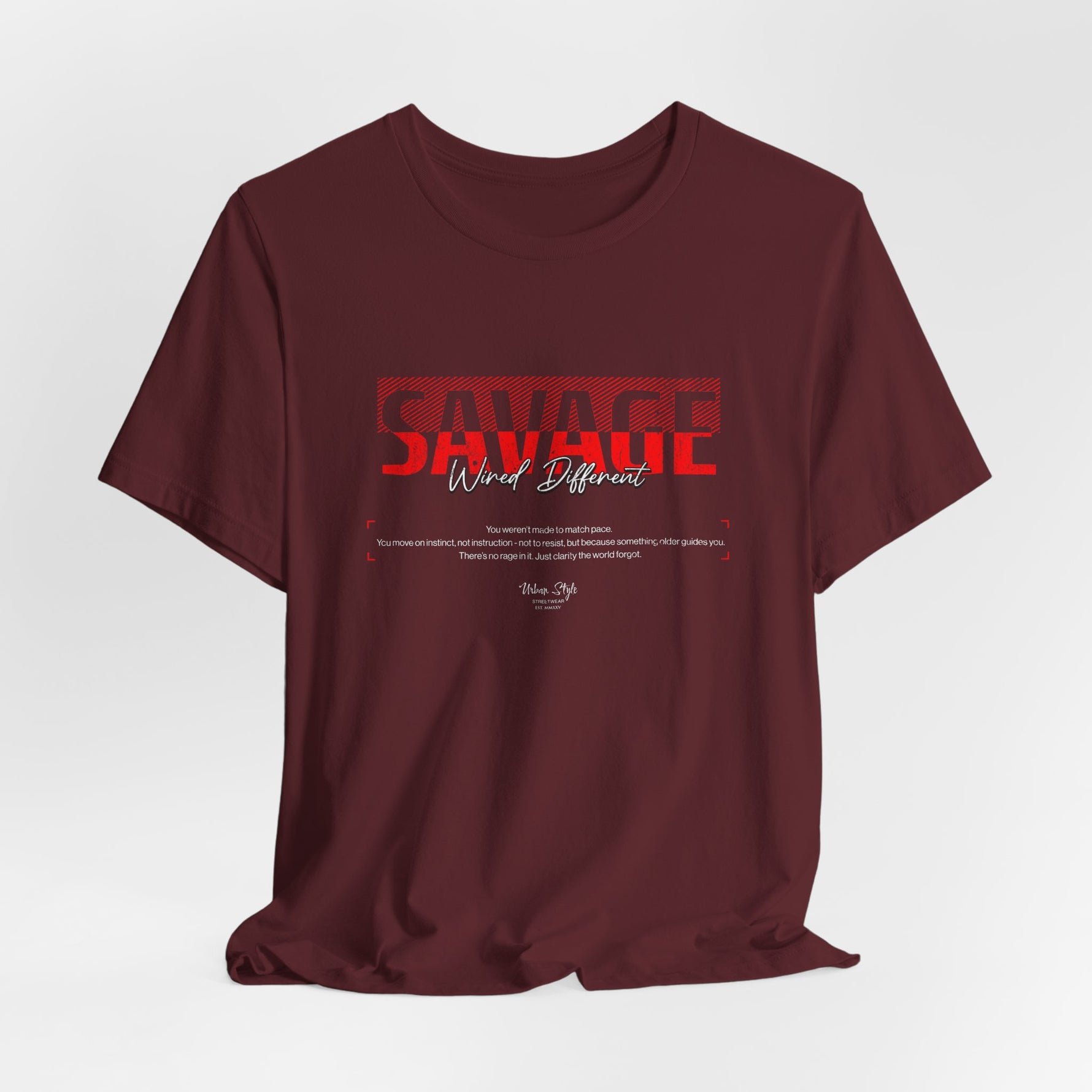 The SAVAGE t-shirt in Maroon — deep-rooted defiance with ancient heat.
