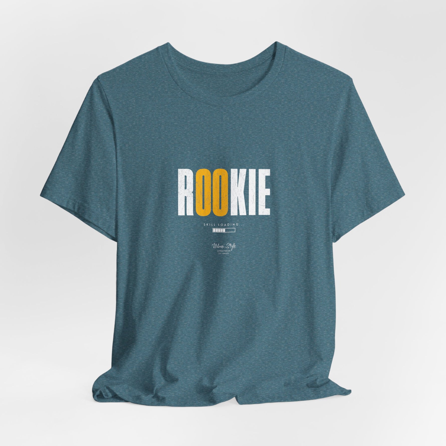 The ROOKIE t-shirt in Heather Deep Teal — quietly watching, taking mental notes.