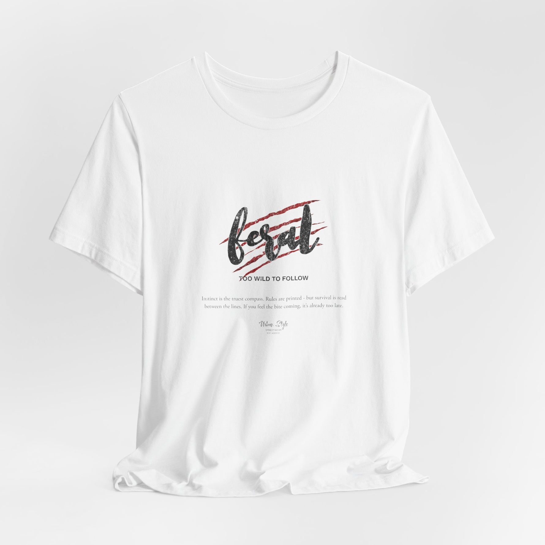 The FERAL t-shirt in White — no distractions. Just instinct on full display.