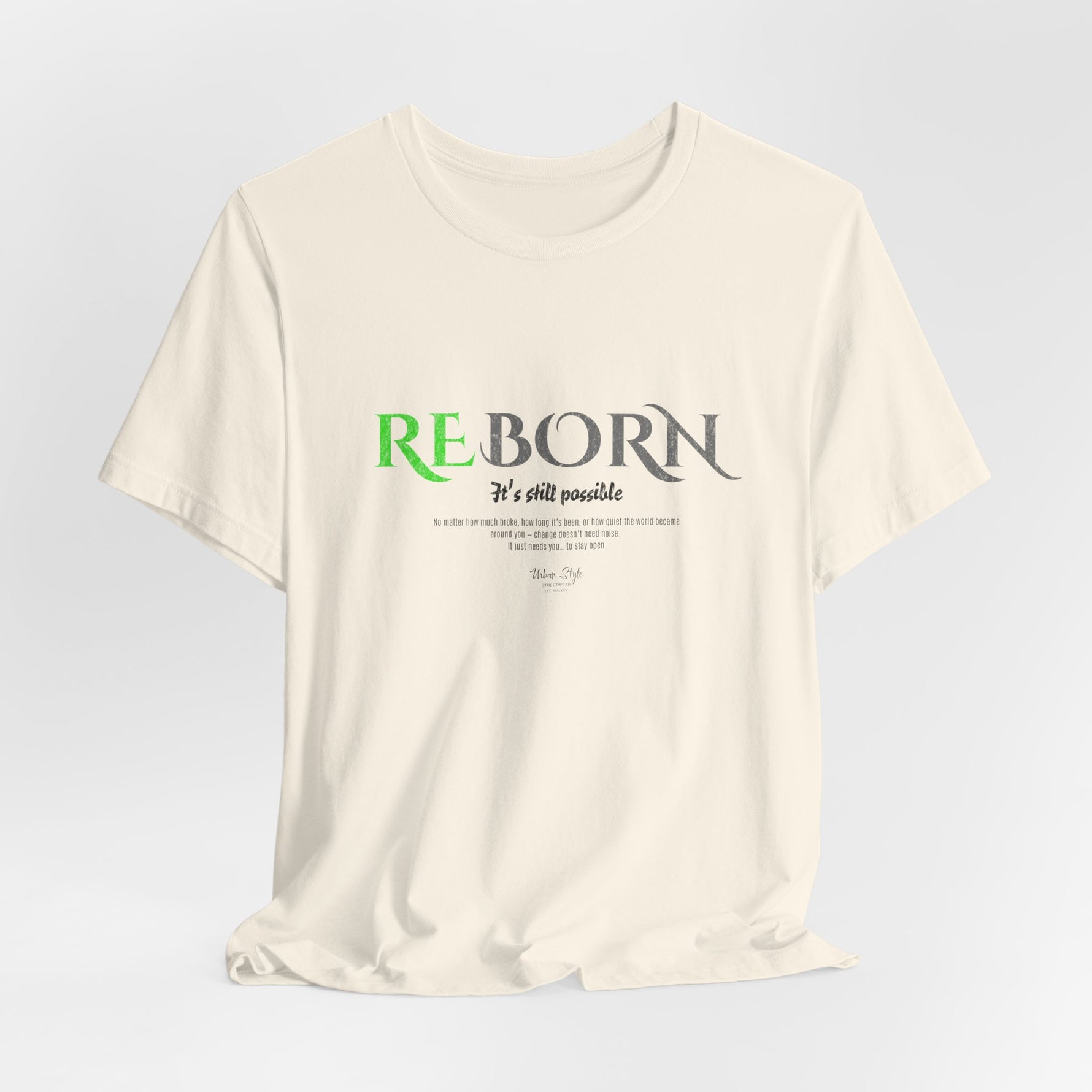 The REBORN t-shirt in Natural — untouched beginnings, born from quiet resolve.