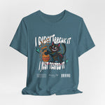 The I Just Tested It t-shirt in heather deep teal — a moody blue-green that adds depth to the vibrant artwork.