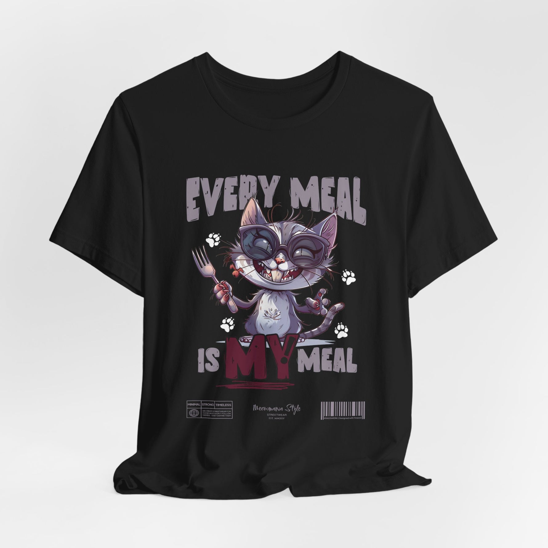 The EVERY MEAL IS MY MEAL t-shirt in black — sleek and striking; the cat illustration glows with attitude.