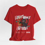 The I Just Tested It t-shirt in red — a bold red canvas that intensifies the drama of the cat’s mischievous moment.