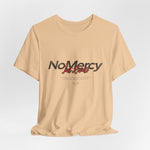 The NO MERCY t-shirt in Sand Dune — dusty paths. Brutal choices.