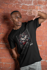 A man poses against a brick wall wearing the "ARIES – GUILTY" tee featuring a muscular ram in a mugshot. The phrase “Fights First. Thinks Later” stands out beneath.
