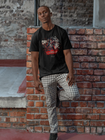 A street-style male model leaning against a red brick wall, wearing the CHŪGI t-shirt from the 7 Virtues of Bushido series. The shirt features a samurai illustration with red and white accents and the quote "Loyalty is silent but unmistakable."