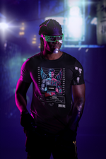 A futuristic urban scene glows in neon as the model stands confidently in the shadows, wearing the Gemini black t-shirt. The design features a winged figure split in color and personality, holding a mugshot sign — a bold visual representation of dual identity and inner contradiction.