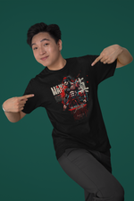 “MAKOTO” black t-shirt by KRASSWERK – lifestyle photo of smiling man pointing at his shirt, proudly wearing the Bushido-inspired design that emphasizes raw honesty and personal truth