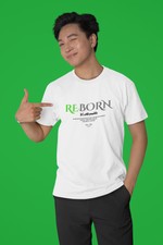 Male model pointing at the REBORN t-shirt in white, winking confidently. The bright green and bold lettering on the shirt stand out against the solid green background, reinforcing the message: “It’s still possible.”