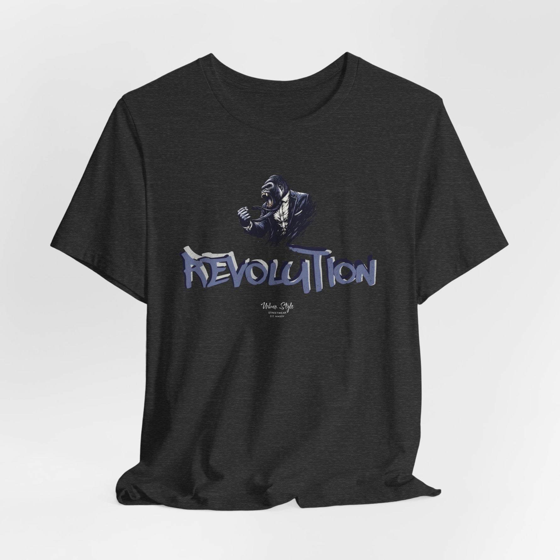 Subtle strength. REVOLUTION tee in Dark Heather Grey.