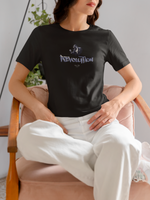 REVOLUTION black tee by KRASSWERK – worn by female model in soft interior setting, relaxed pose highlighting minimal streetwear tone
