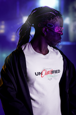 Model wearing the white “PROJECT UNCLASSIFIED” t-shirt in a futuristic neon-lit cityscape. The black and red text contrasts sharply against the crisp white fabric, with cyberpunk-inspired purple light casting across his braided hair and tech visor. The model looks sideways, partially cloaked in a dark jacket, merging retro espionage with a digital-age rebellion.