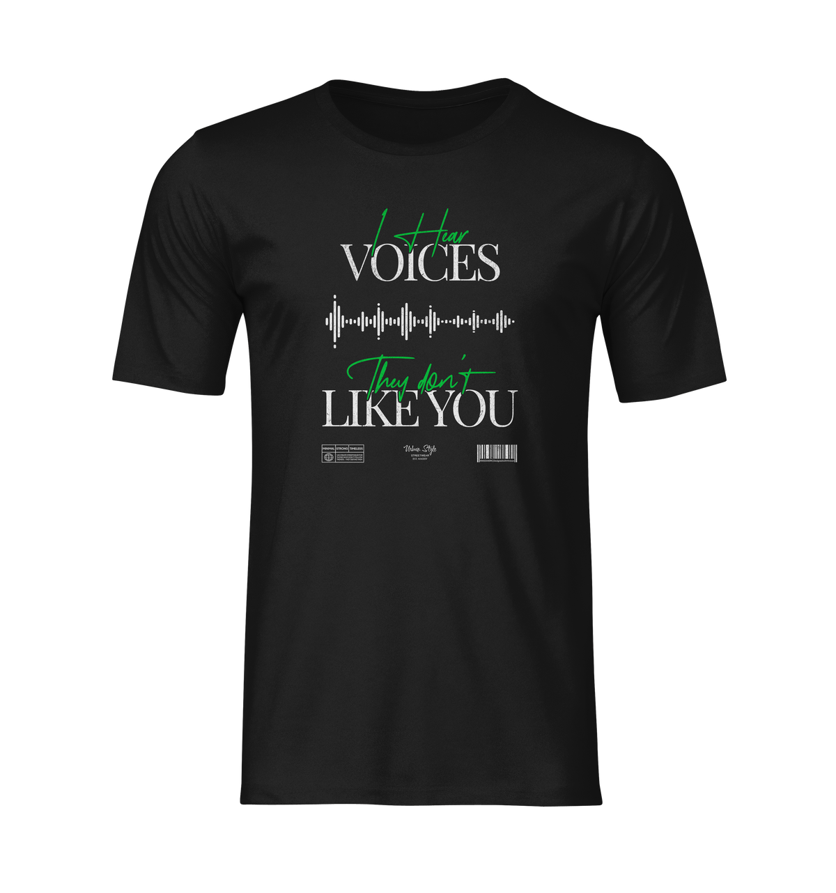 Front view of the "I Hear Voices / They Don’t Like You" t-shirt in black — clean ghost mockup showing the green script and waveform design in high detail.