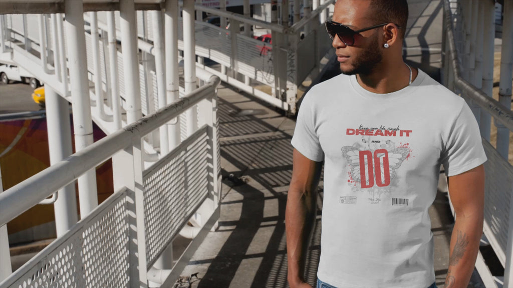 DREAM IT DO IT Video — Graphic Tee in WHITE
Minimal design. Maximum presence.
This shirt speaks before you do — and keeps talking after.
Crafted with purpose, printed with precision,
and built for minds that don’t follow trends — they start them.
This is more than fabric. It’s statement in motion.
KRASSWERK | Designed with finesse